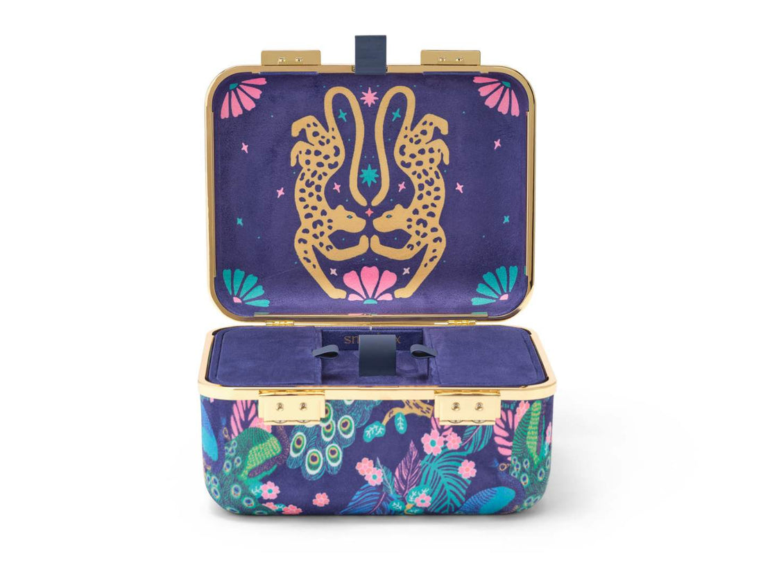Our award-winning peacock print keyless lockbox keeps contents secure in style. Use it for safe storage for valuables and vices.
