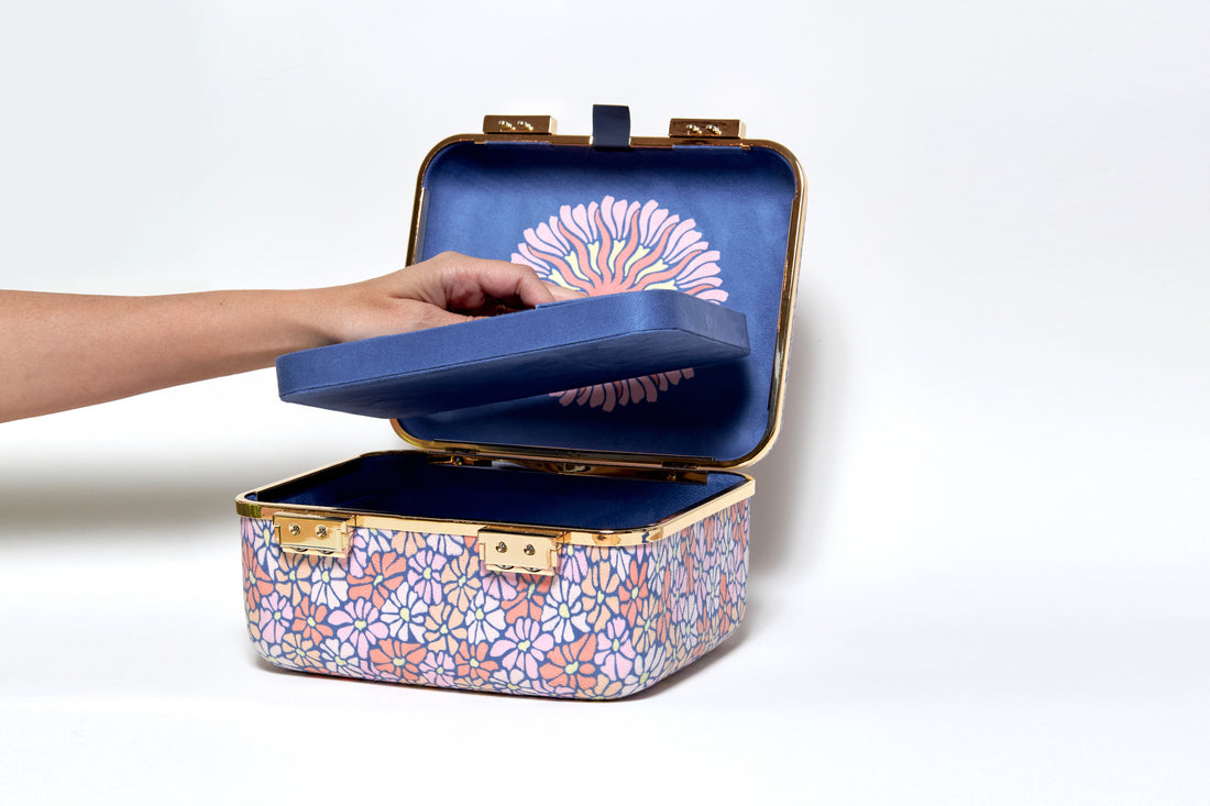 The interior tray can be removed to make space for larger objects. You can use the tray as a standalone jewelry organizer. 